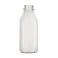 Glass bottle filled with milk.