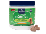 Container of dog allergy and immune supplements with treats beside it.