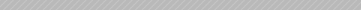 A pattern of slanted, evenly spaced white lines on a black background.
