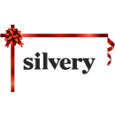 A red ribbon and bow around a card with the word 'silvery.'