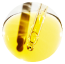 A pipette dripping liquid into a petri dish containing a yellow substance.