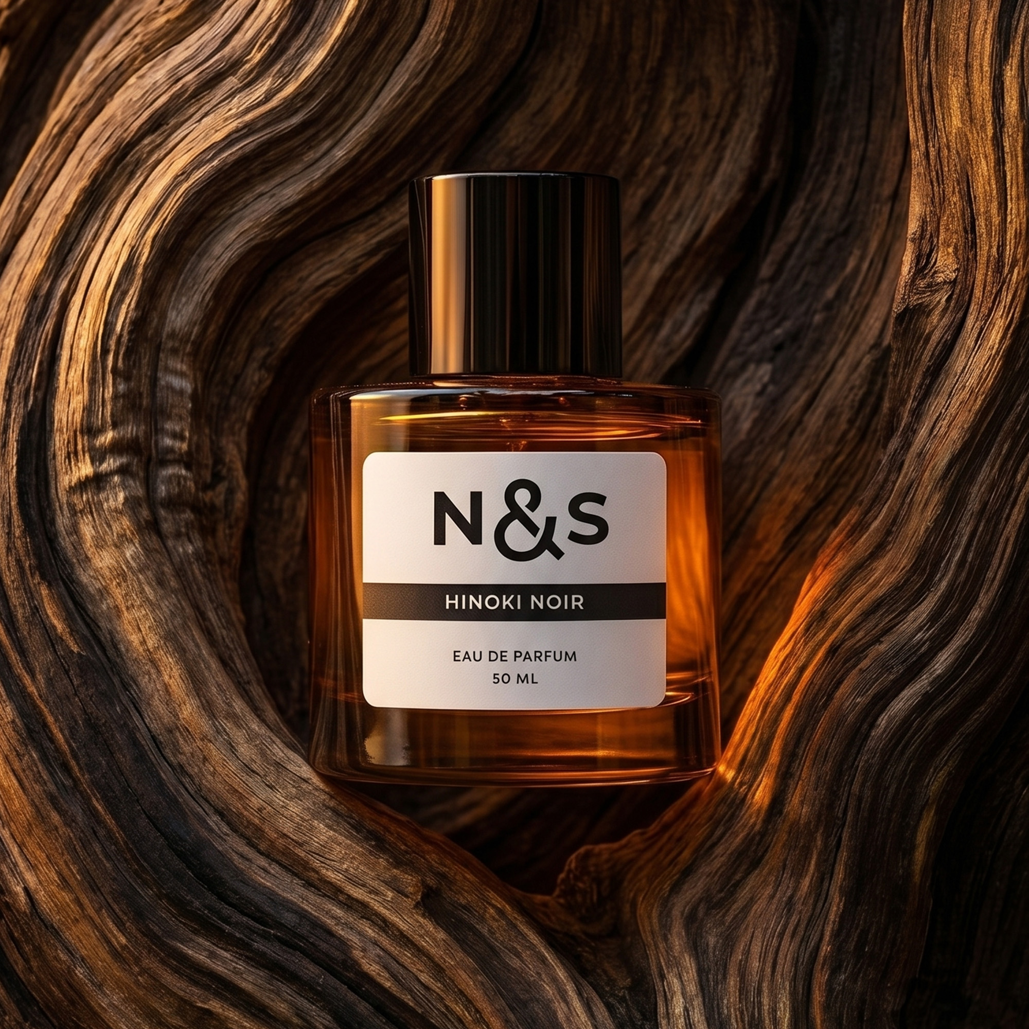 A bottle of N&S Hinoki Noir perfume resting on a piece of deeply grooved, weathered wood.