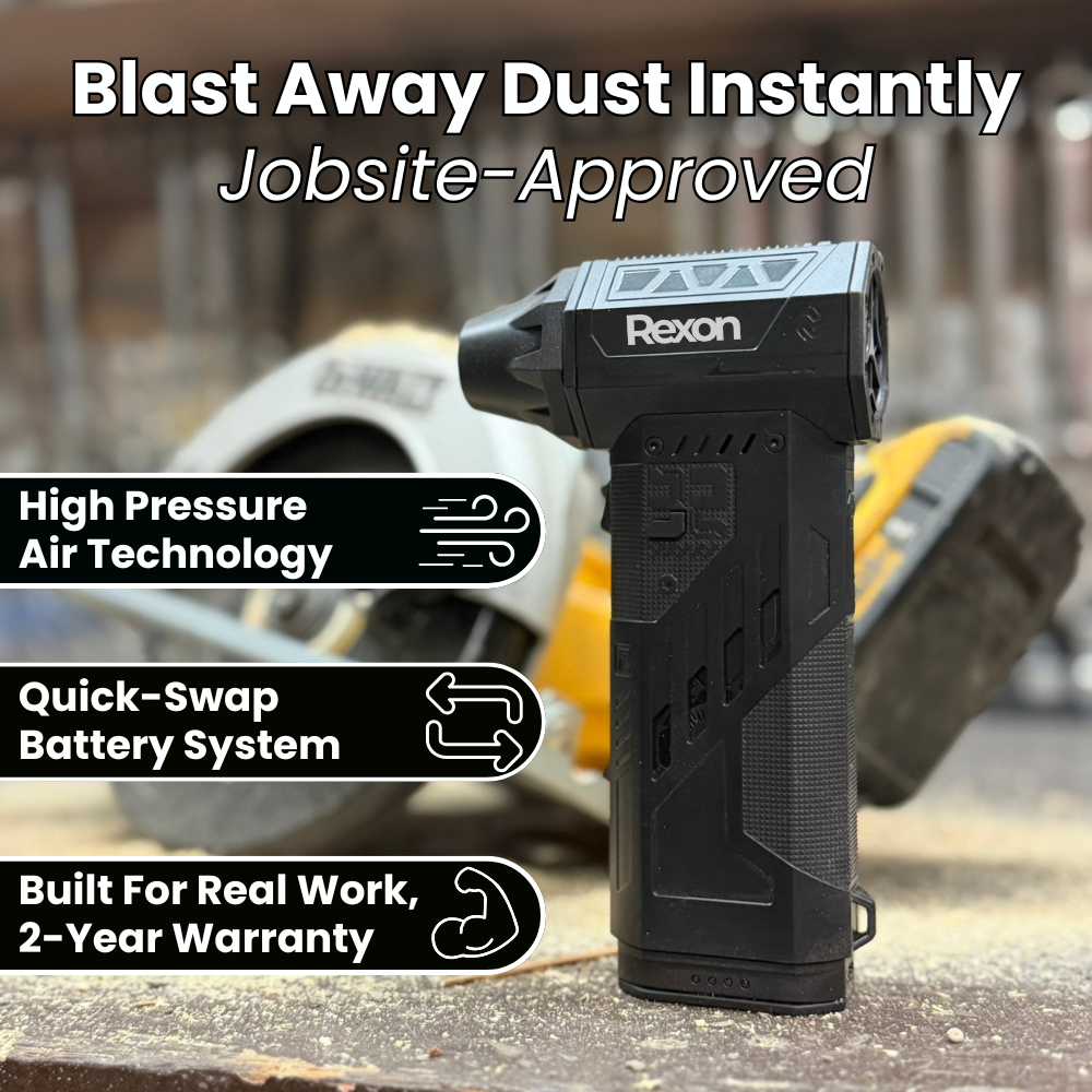 Black handheld device with multiple nozzle attachments on a grey surface.