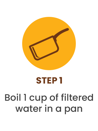 An icon of a saucepan with the text: Step 1, Boil 1 cup of filtered water in a pan.