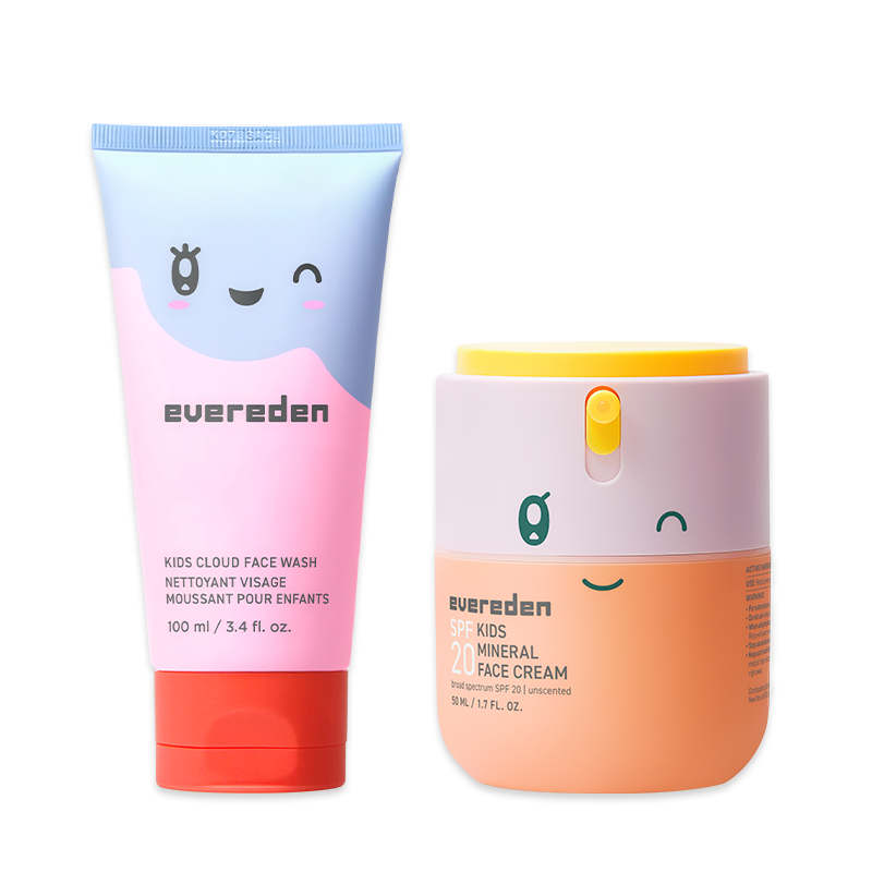 A tube of Evereden Kids Cloud Face Wash next to a pump bottle of Evereden SPF Kids Mineral Face Cream.