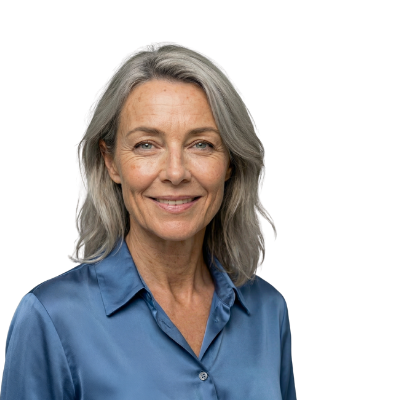 A smiling, middle-aged woman with grey hair wearing a blue silk blouse against a dark background.