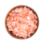 A wooden bowl filled with pink Himalayan salt crystals.