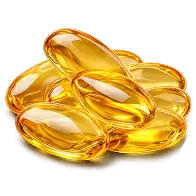 A small pile of golden, oval-shaped softgel capsules on a white background.