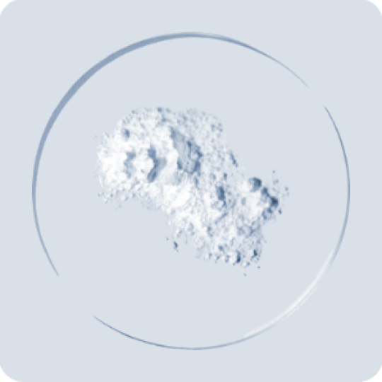 White powder on a clear dish.