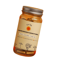 A jar labeled 'Mushroom Mind Fuel' with capsules inside.