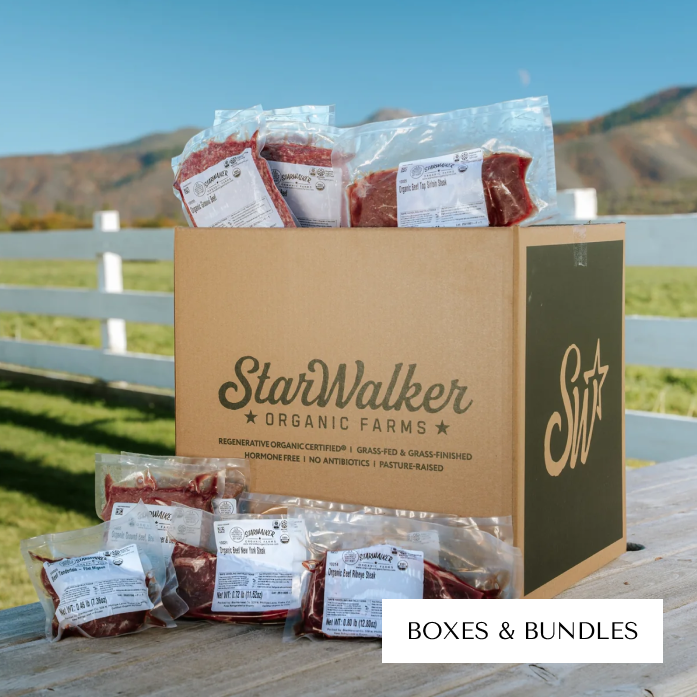 Box of packaged meat with 'StarWalker Organic Farms' logo outdoors.