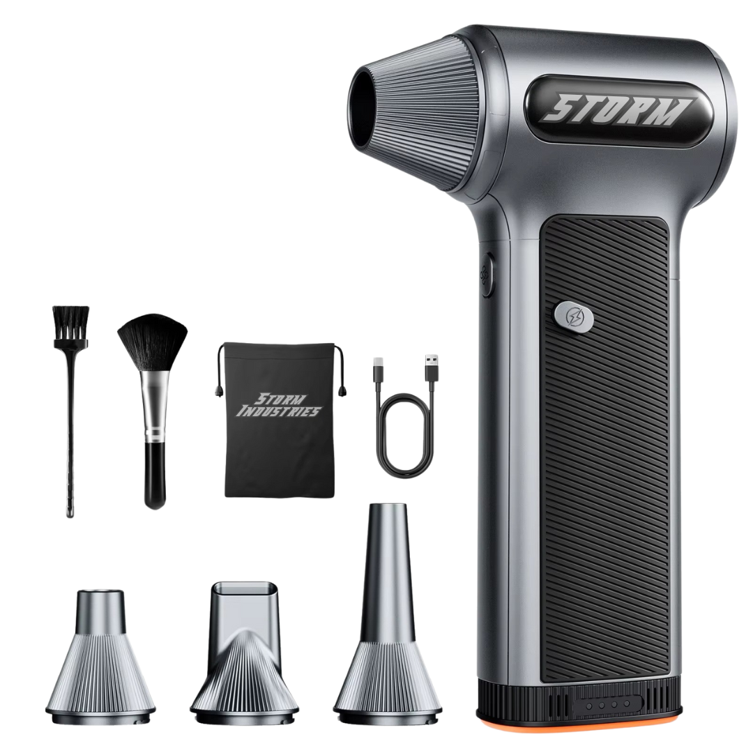 Cordless air duster with accessories: brushes, nozzles, charging cable, and pouch.
