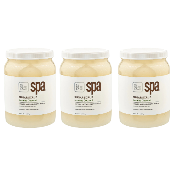 Three jars of jasmine coconut sugar scrub with white labels.