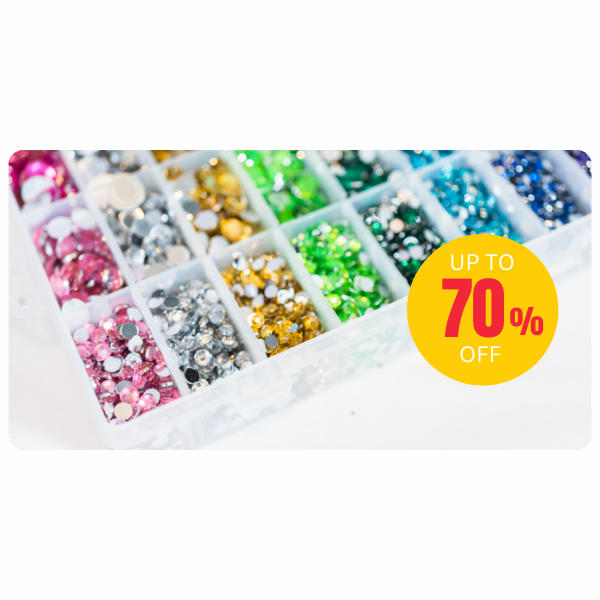 Box of colorful rhinestones with a 70% off discount label.