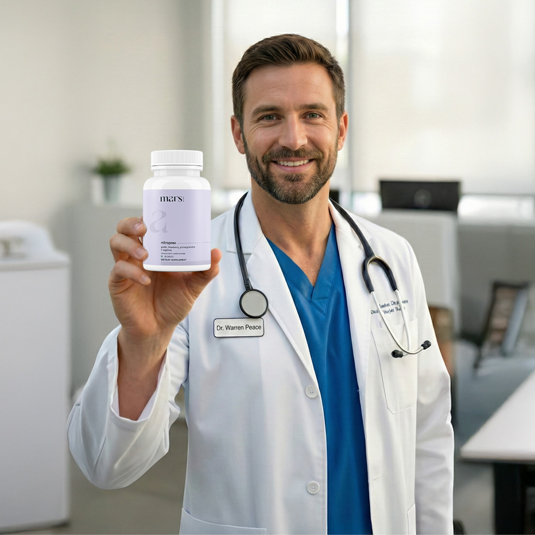A smiling doctor in a white coat and stethoscope holds up a white bottle of supplements.