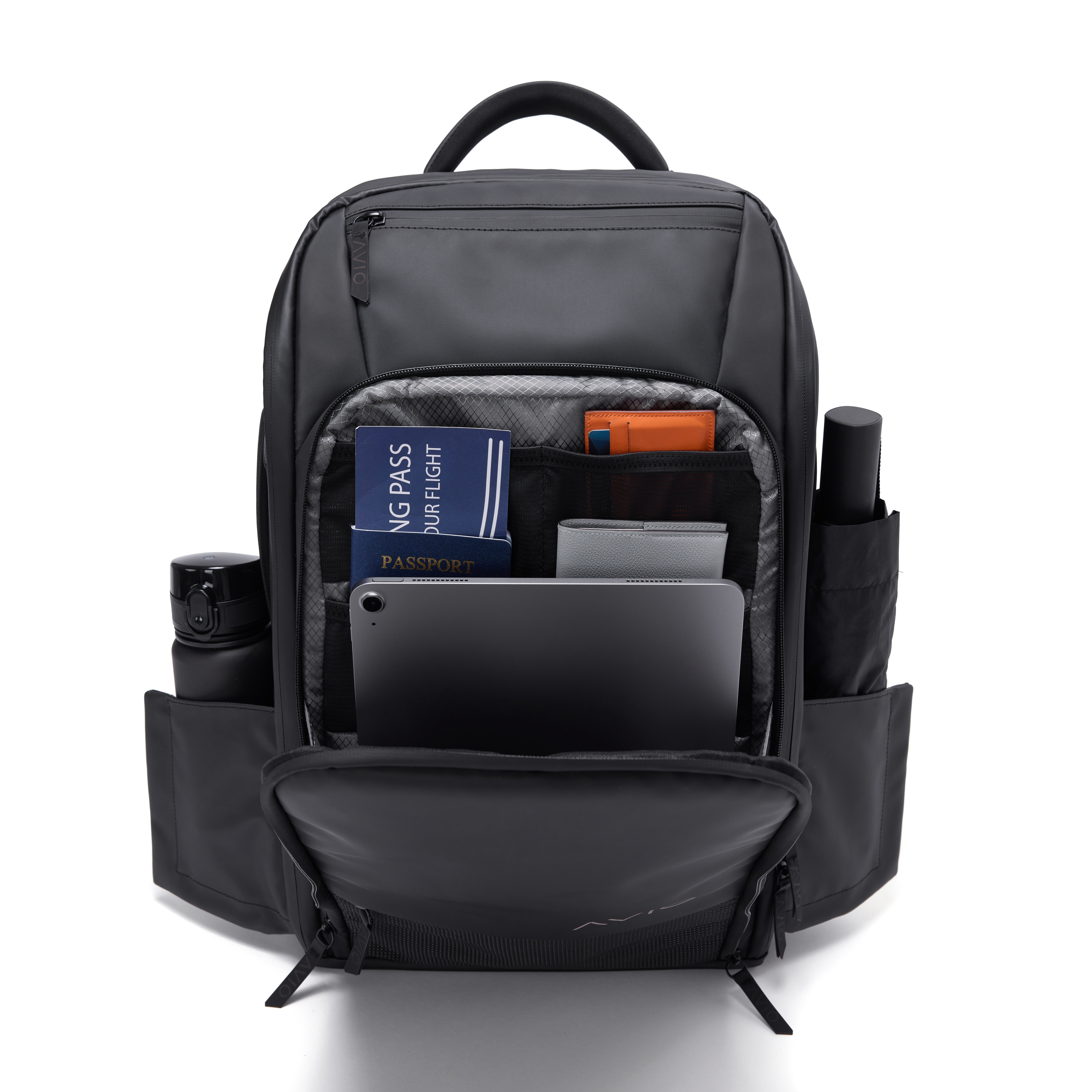 Open black backpack with travel essentials, including a tablet, passport, and water bottle.