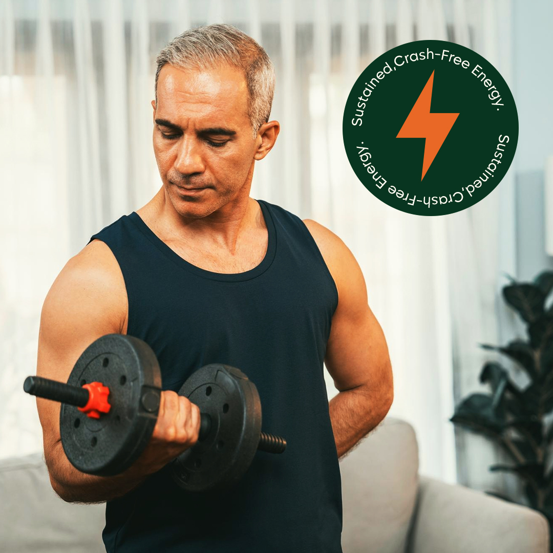 Man in a tank top lifting a dumbbell indoors with energy symbol graphic.