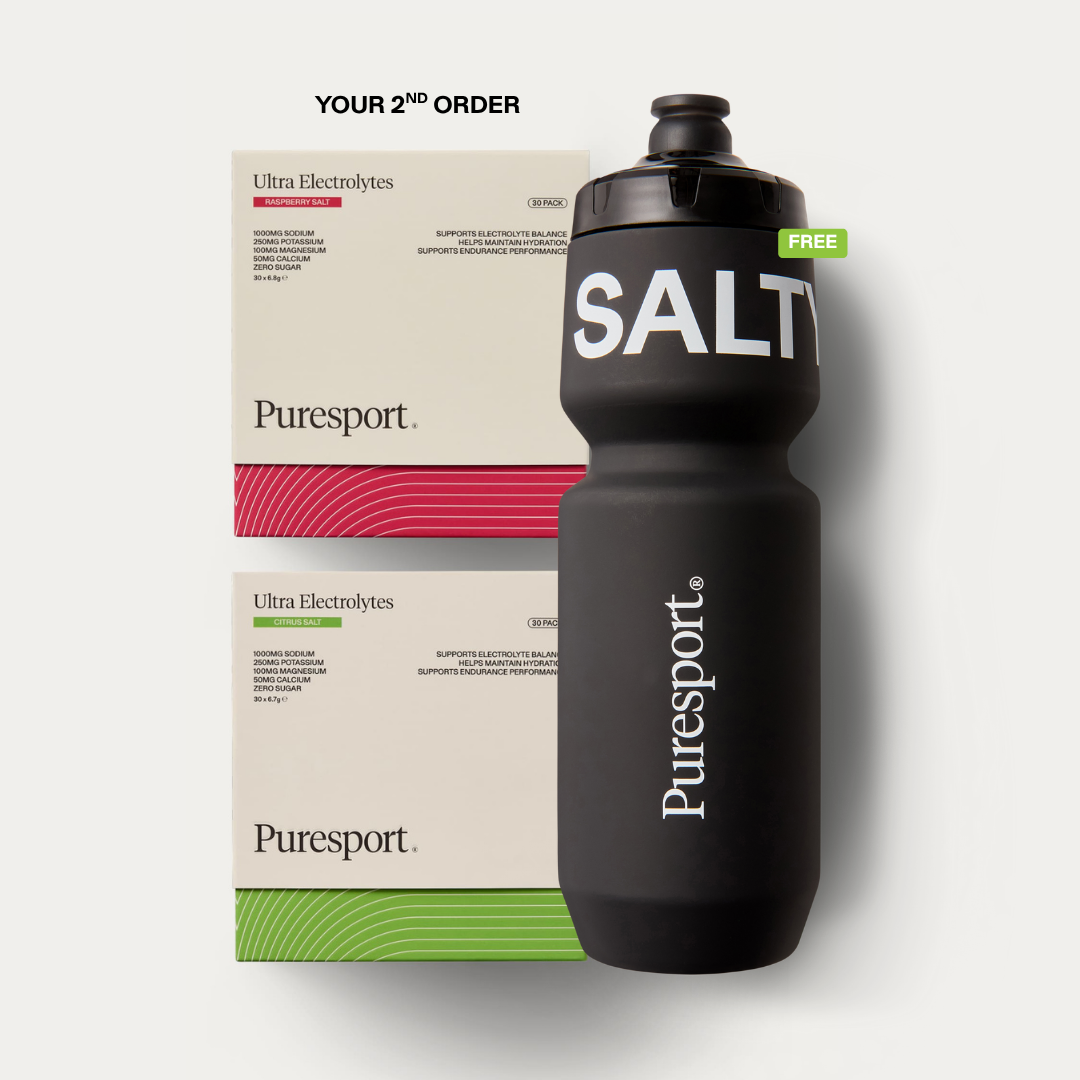Two Puresport Ultra Electrolytes boxes and a black water bottle labeled 'SALT'.