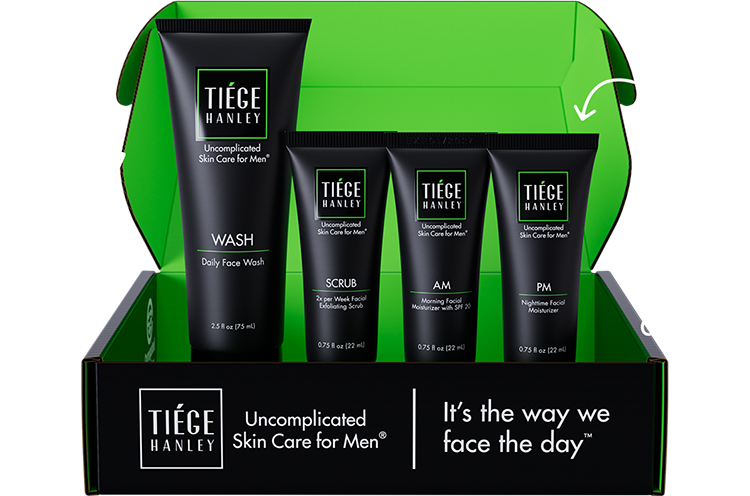Tiege Hanley skincare products in a green box, including face wash, scrub, and moisturizers.
