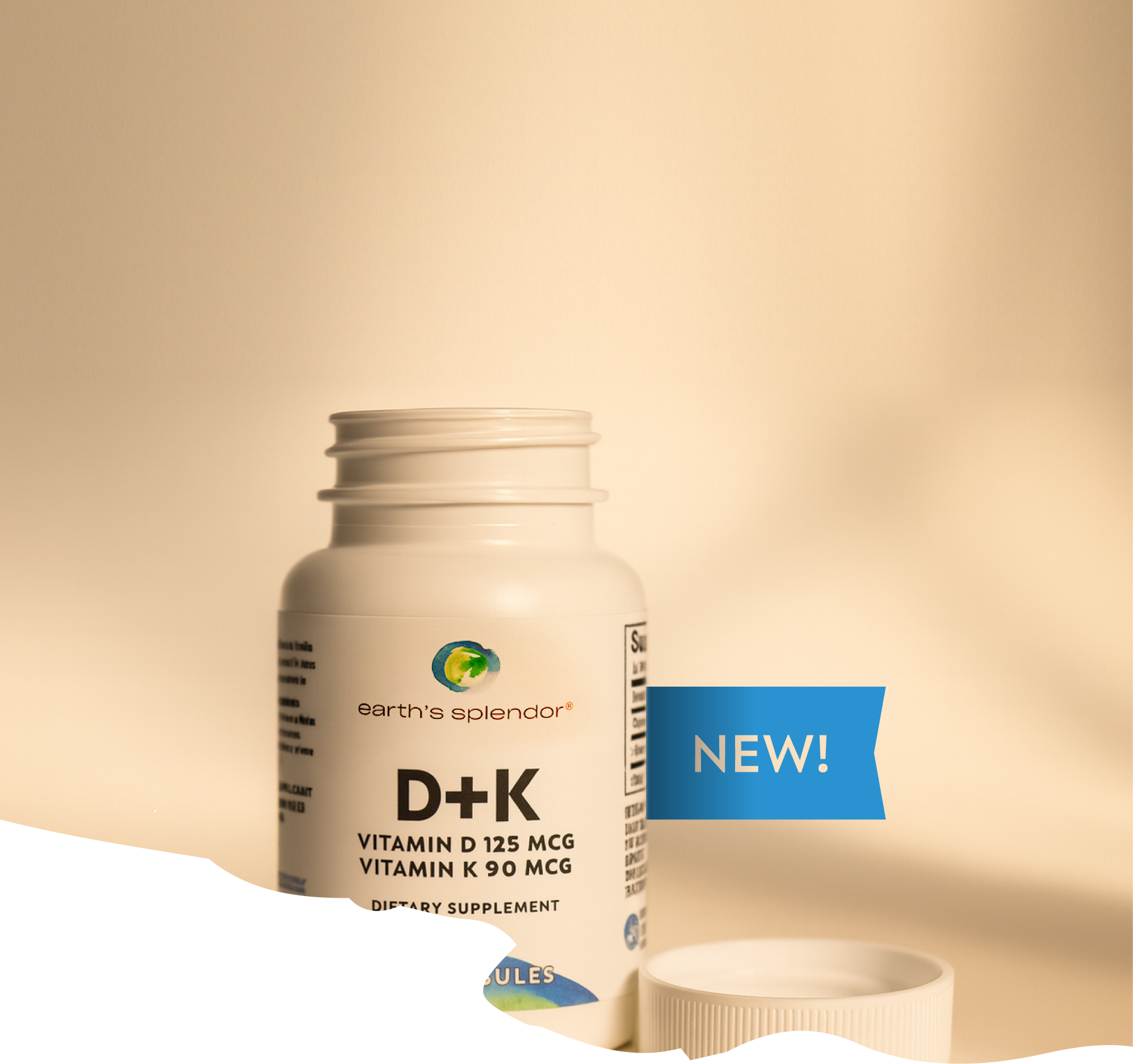 Open bottle of dietary supplement labeled D+K with 'NEW!' signage.
