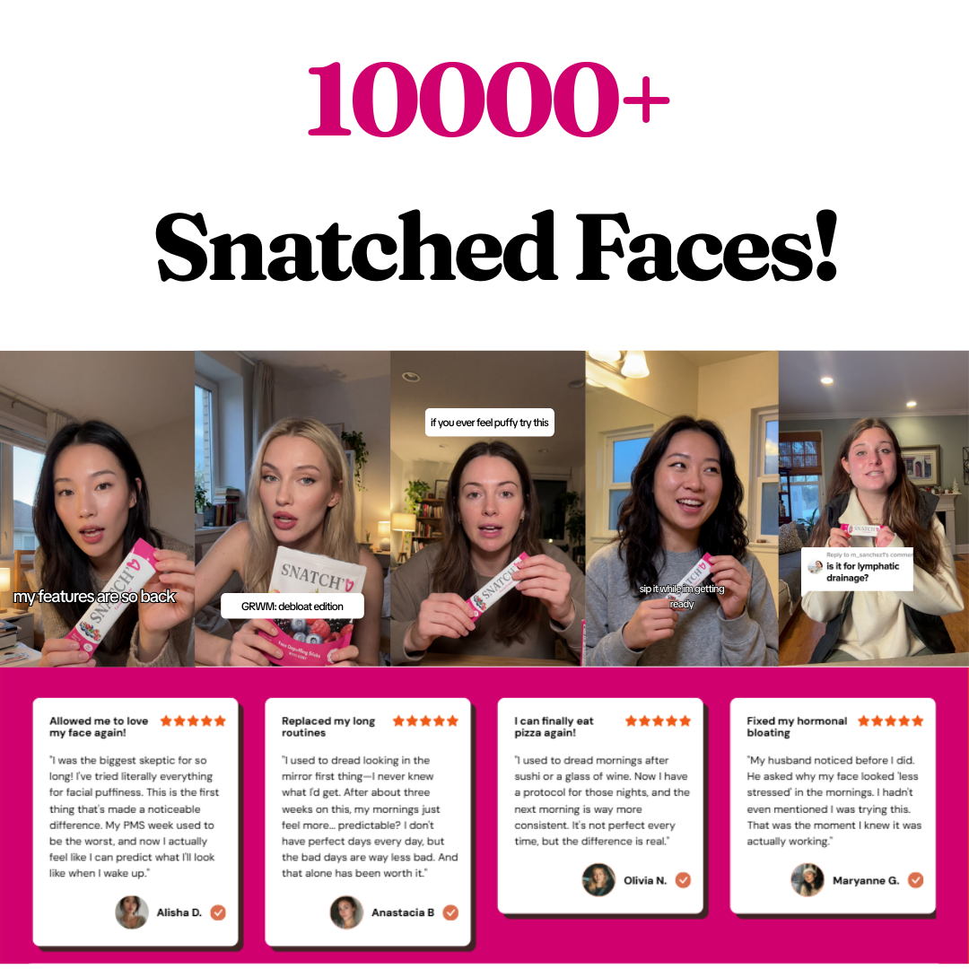 Open book and candle on a white bed.