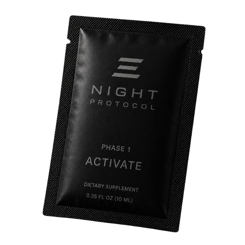 A black foil packet of Night Protocol Phase 1 Activate dietary supplement on a white background.