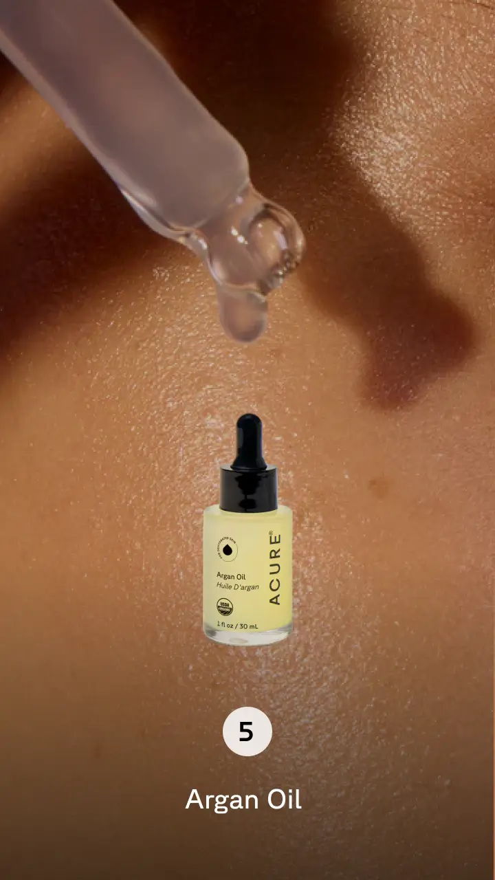 Dropper applying product to skin. Step 5 argan oil.
