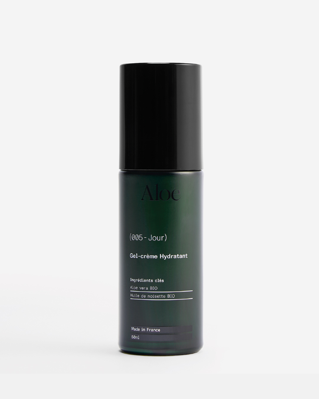 Dark bottle of Aloe gel-crème hydrant with a black cap.
