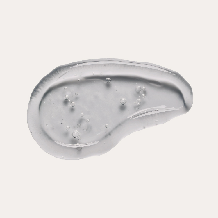 Clear gel with bubbles on a white background.