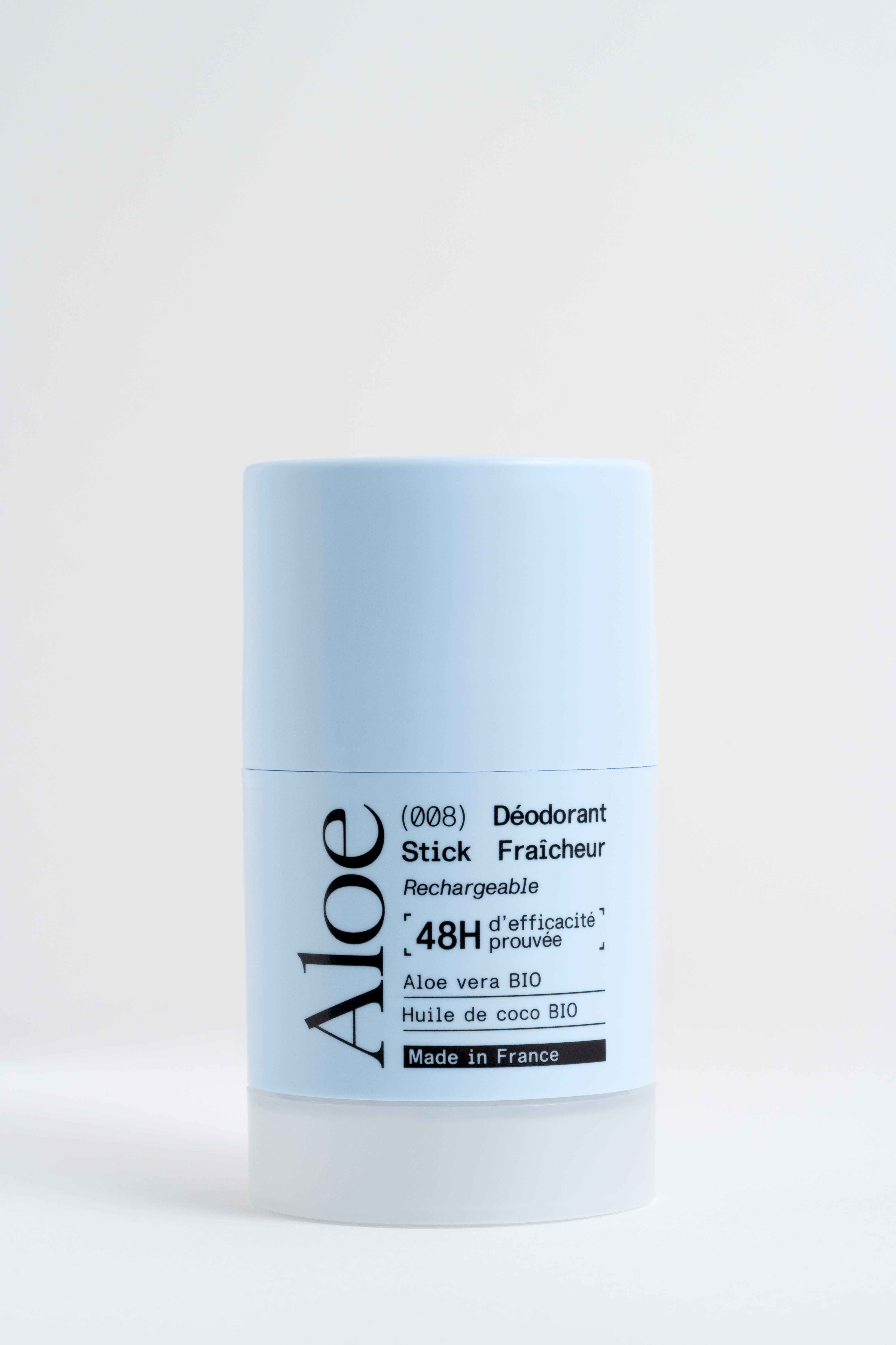 Light blue deodorant stick with black text on white background.