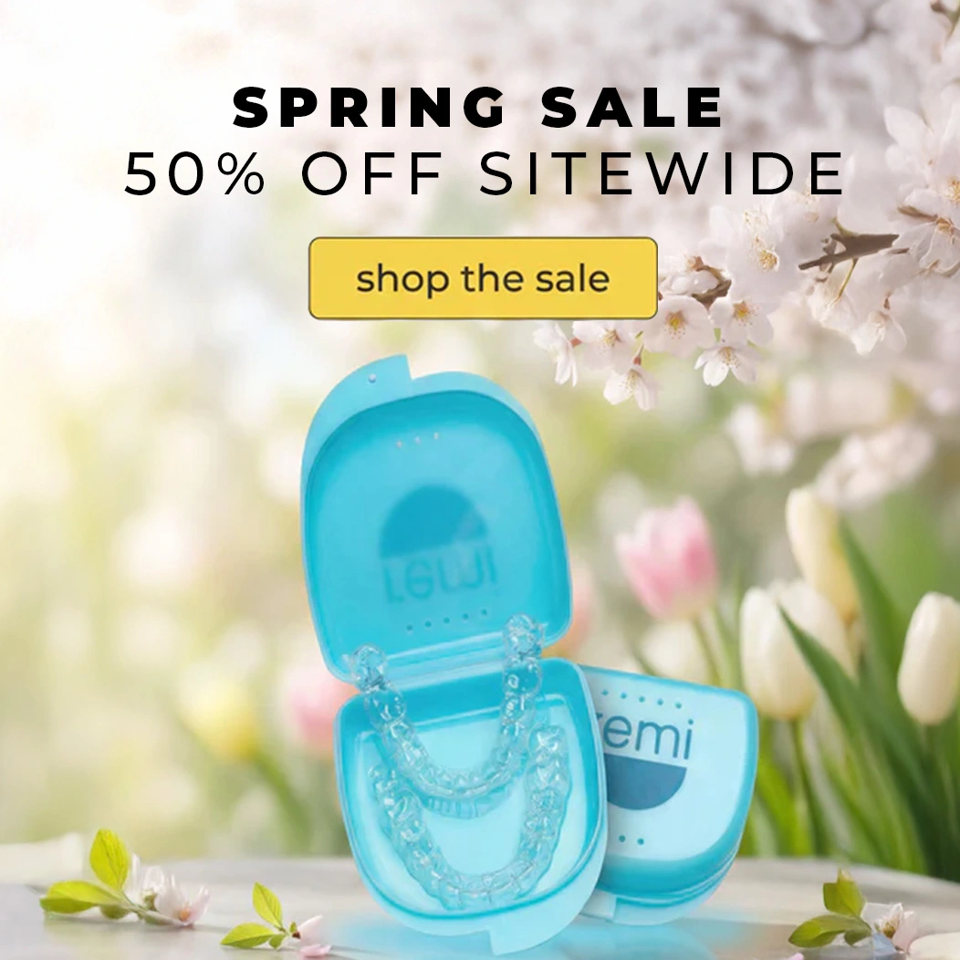 An ad for a Spring Sale featuring clear dental aligners in a blue case, set against a floral background.