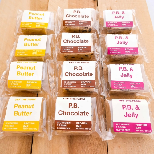 Nine packaged protein bars in three flavors: Peanut Butter, P.B. Chocolate, and P.B. & Jelly.