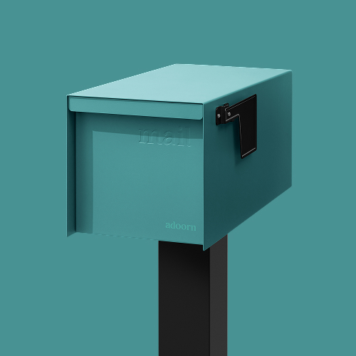 Teal mailbox on a black post against a teal background.