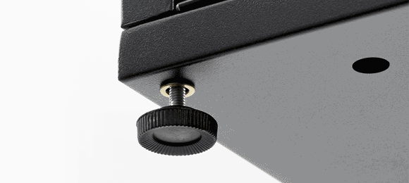 Close-up of a black knob screw on a metal surface.
