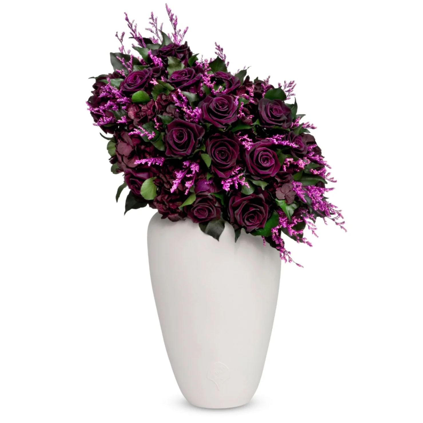 Purple roses and flowers in a white vase.