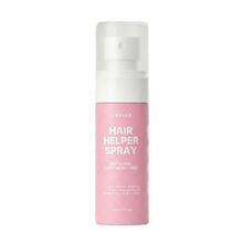 A pink and white bottle of Moremo Hair Helper Spray against a white background.