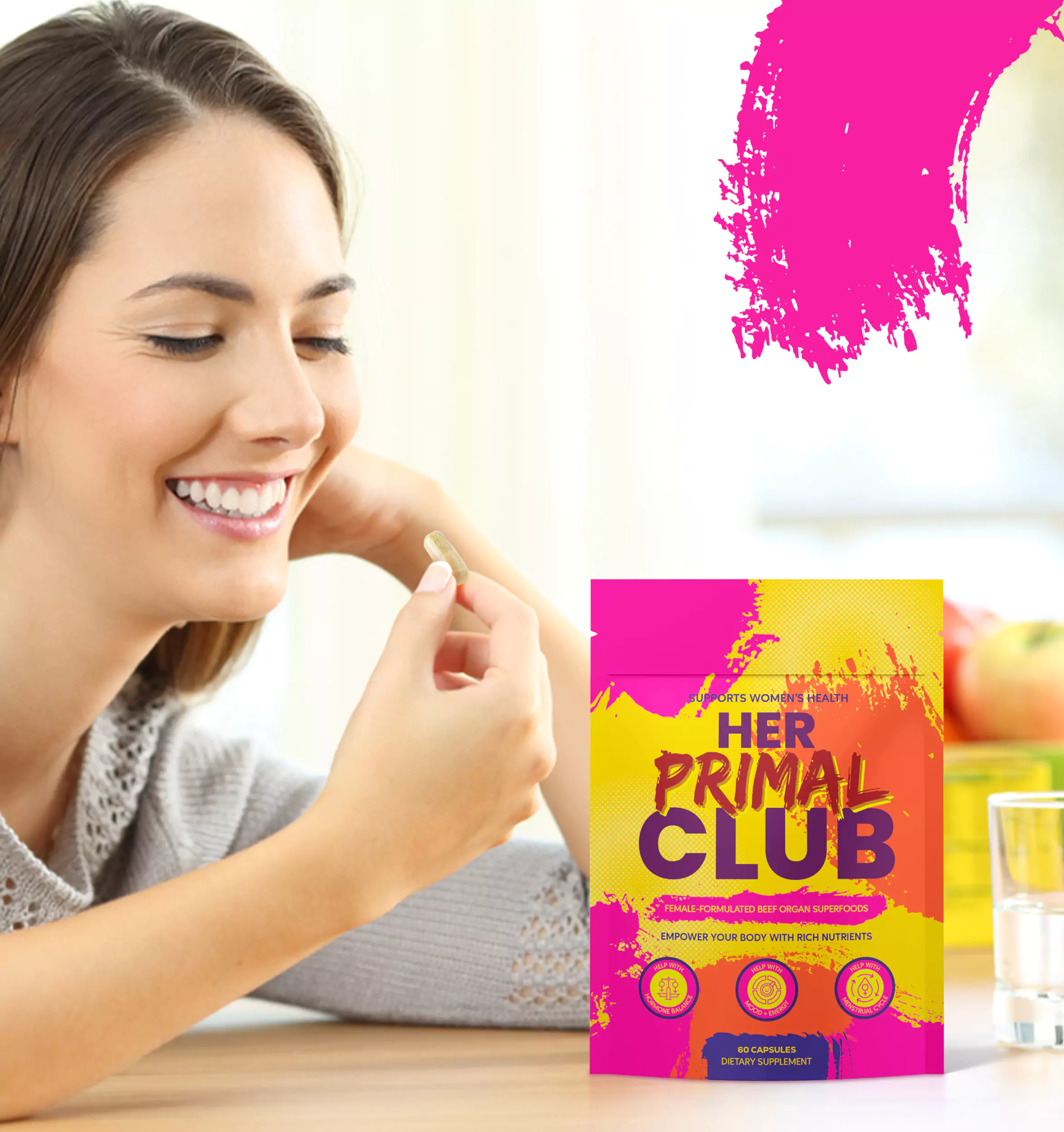 Smiling woman holding a capsule near a colorful supplement package.