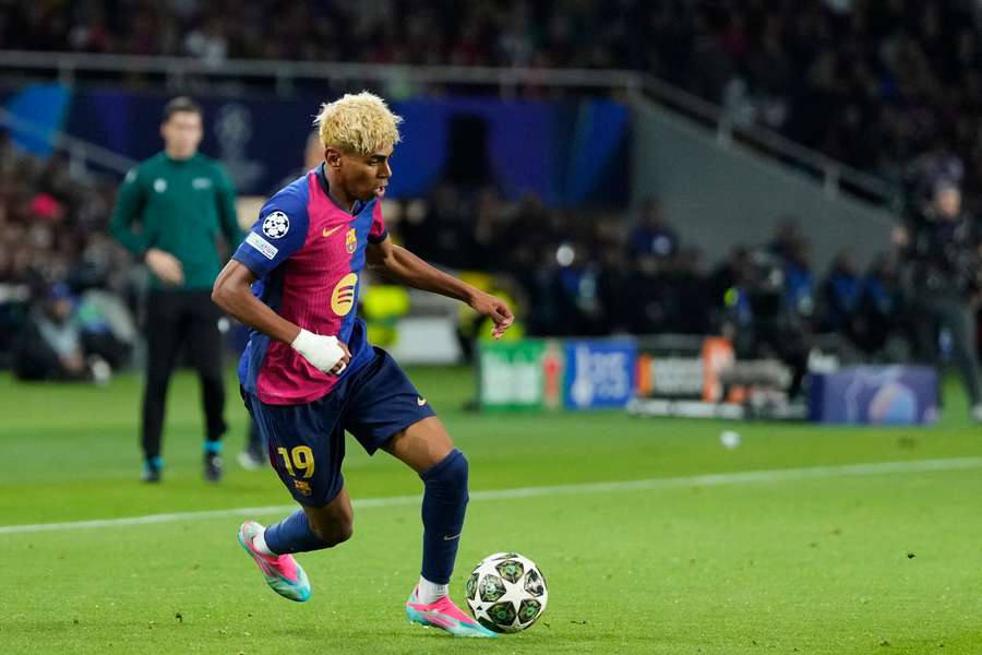 Soccer player in action on the field during a match.