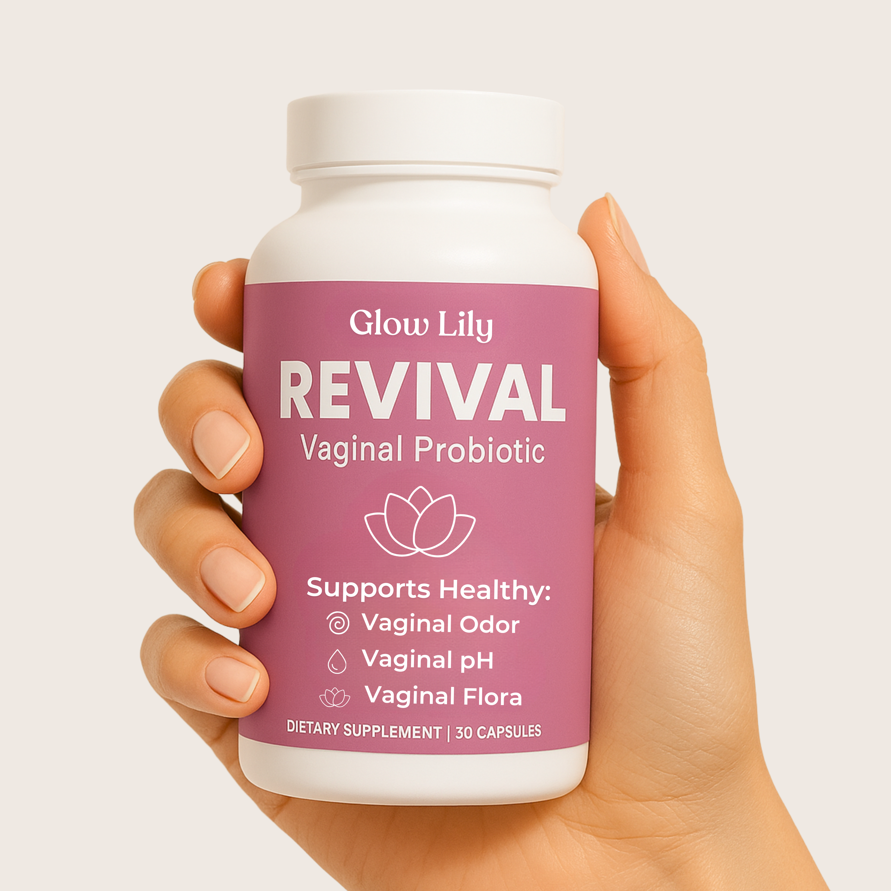 Hand holding a bottle of Glow Lily Revival Vaginal Probiotic.