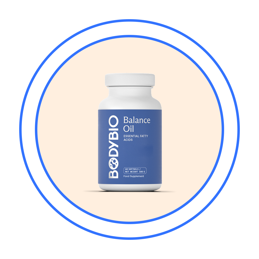 A white bottle of Bodybio Balance Oil supplement centered within two concentric blue rings.