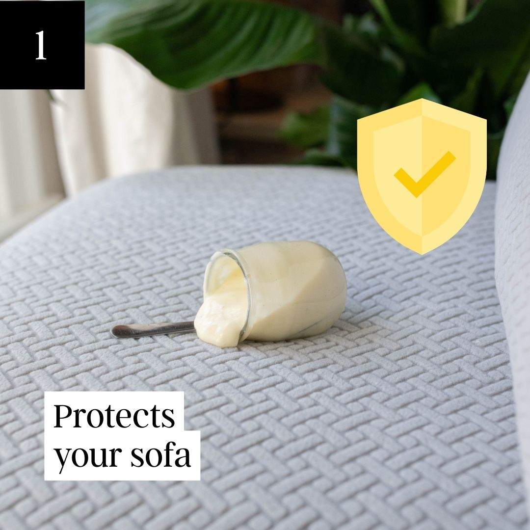 A dog's muddy paw prints on a light-colored sofa, with text and a graphic promoting sofa protection.
