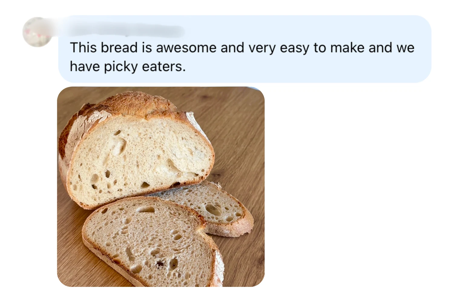 A screenshot of a text message praising a loaf of sliced rustic bread pictured below it.