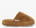 Brown fuzzy slipper with a white tag on a white background.