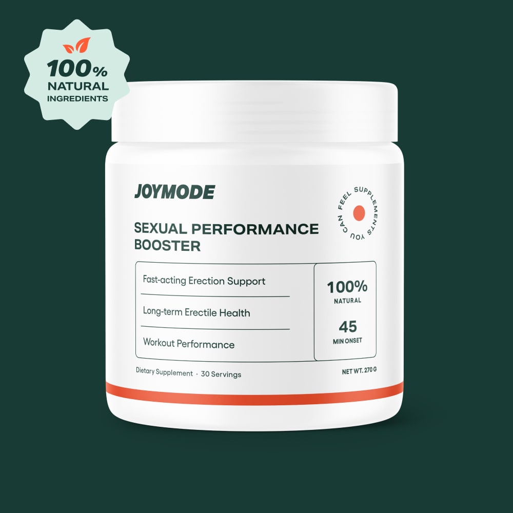 White container labeled 'Joymode Sexual Performance Booster' on a dark green background.