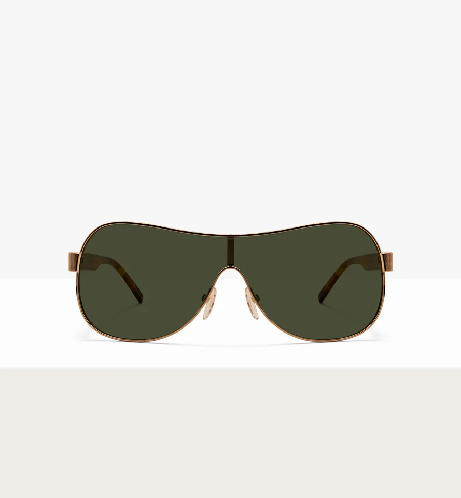 A pair of gold-framed shield sunglasses with dark green lenses on a white background.