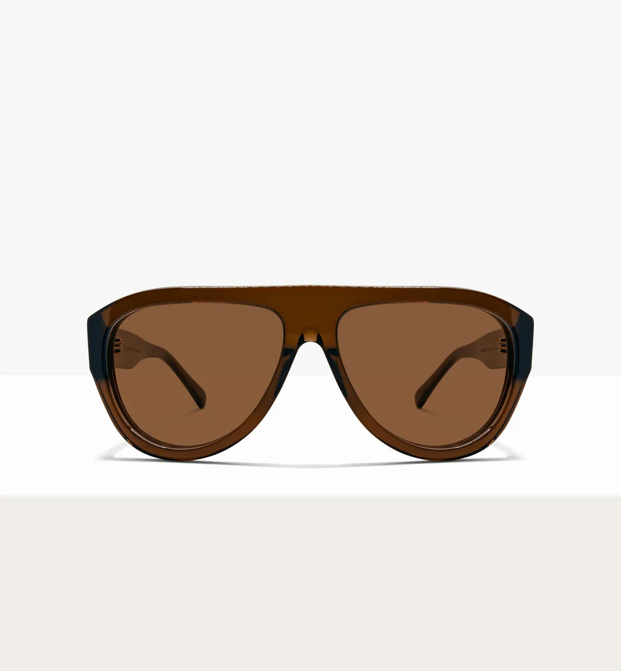 A pair of oversized brown shield sunglasses with brown lenses, shot against a white background.