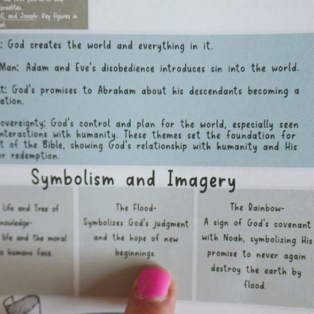 A finger with pink nail polish points to text on a page about biblical symbolism and imagery.