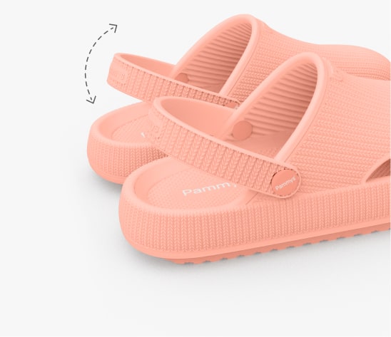 Pink rubber sandals with adjustable back straps on a white background.
