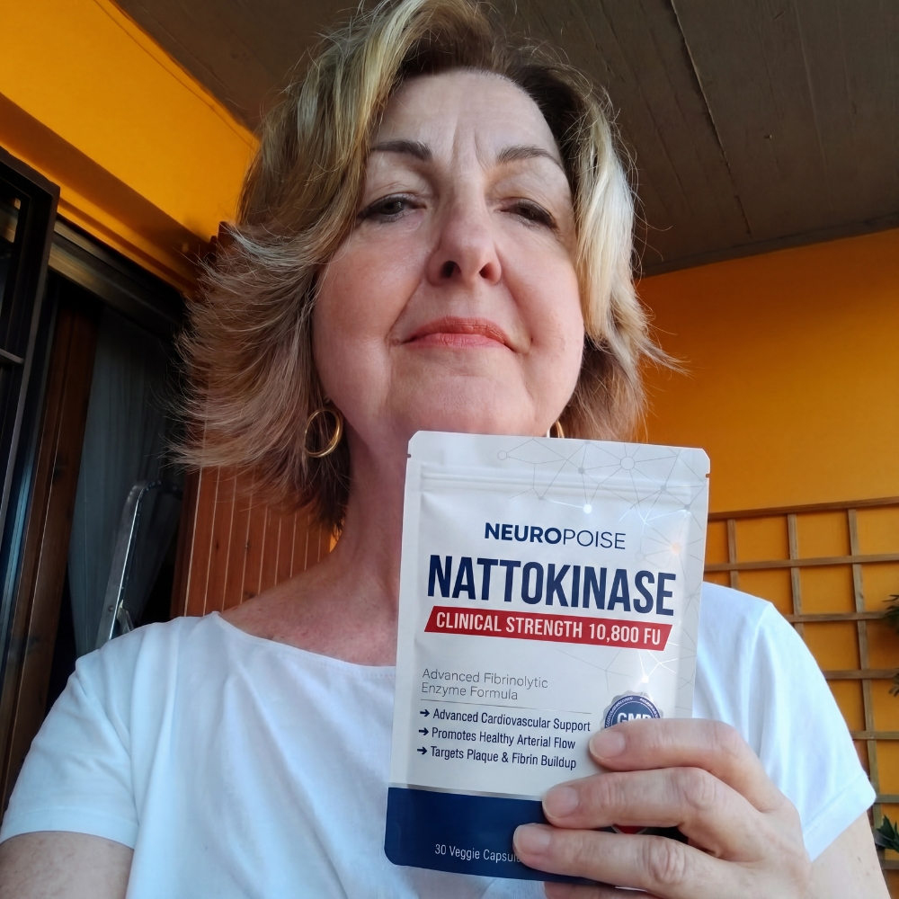 A woman with blonde hair holds a pouch of Neuropoise Nattokinase supplement.