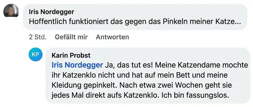 A screenshot of a social media conversation in German between two users about their cats.